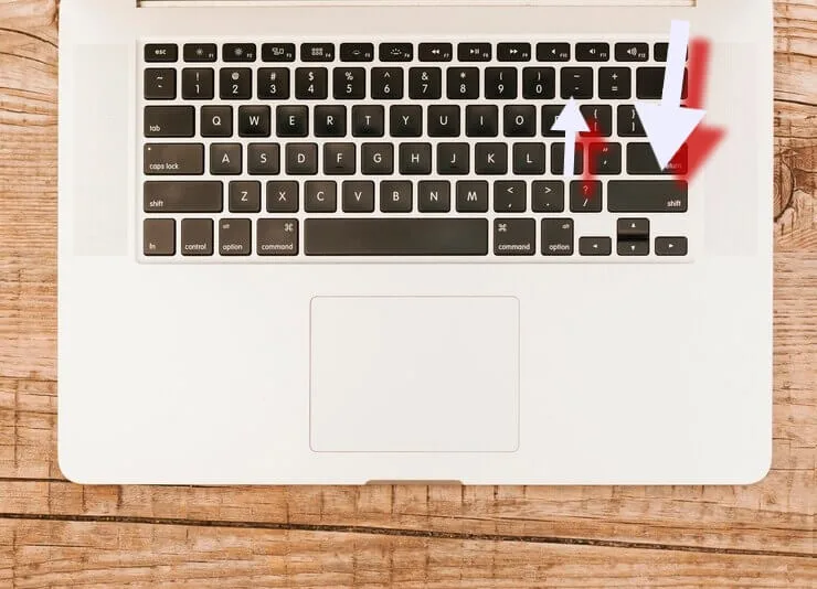 Escribir signo de interrogación en laptop